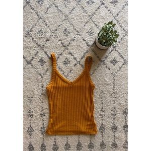 Gold ribbed tank